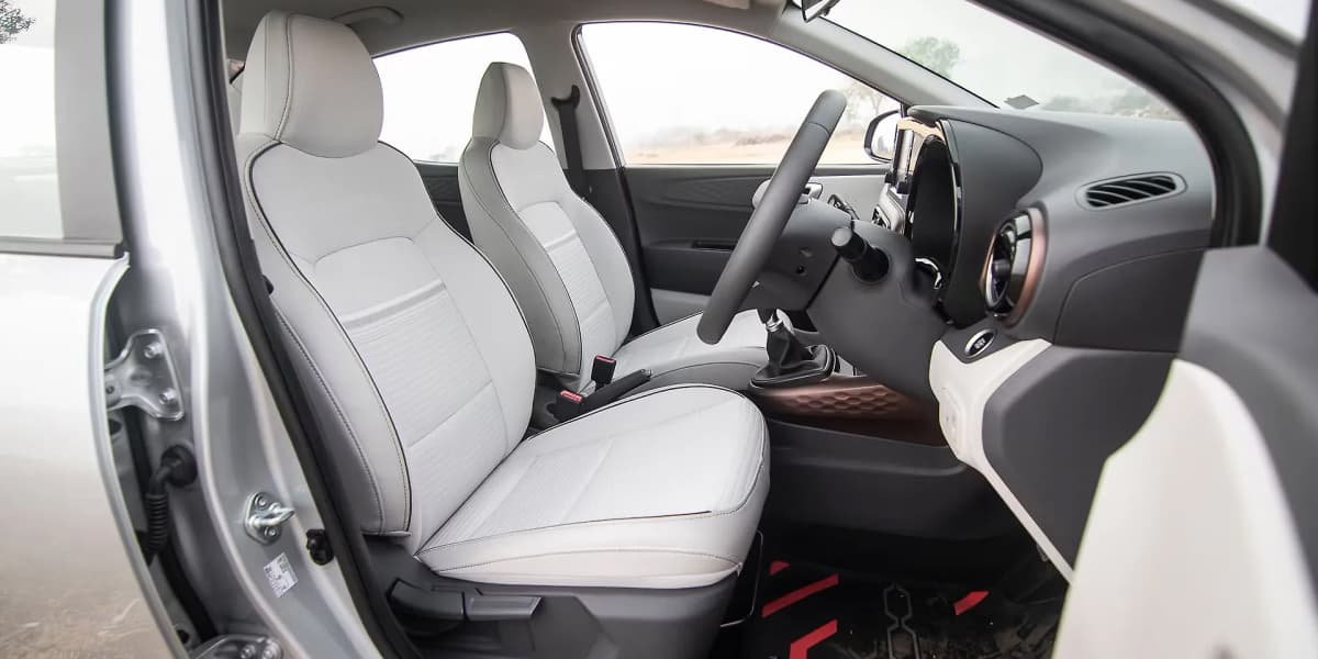 Interior View of Hyundai Aura Premium Front Row Seating Hyundai Aura Front Seats