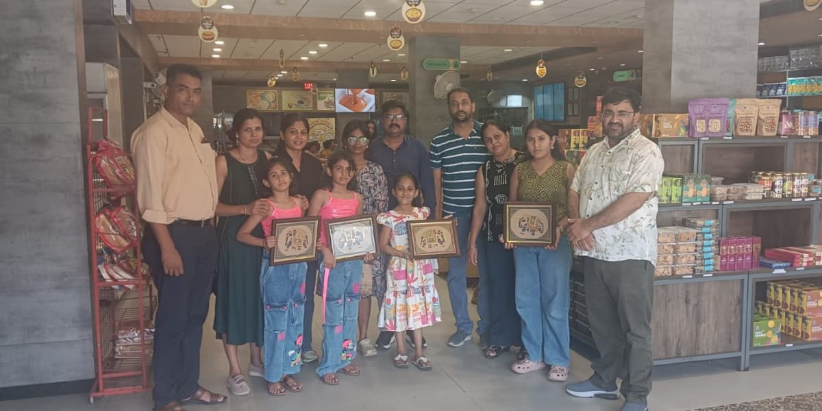 Happy Tourists Holding Framed Elephant Paintings in Store Tourists with Rajasthan Art